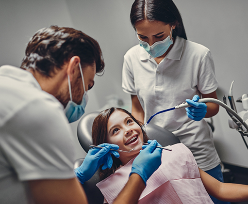 Young girl receiving a dental checkup