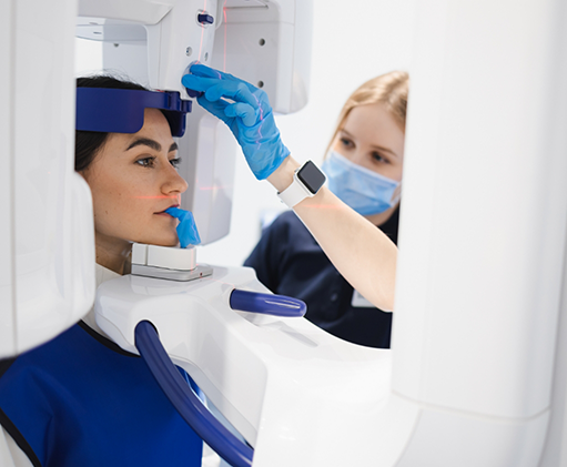 Dental patient getting a scan of her mouth and jaws