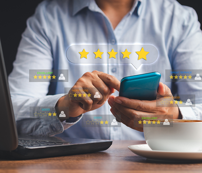 Person looking at several reviews on their phone